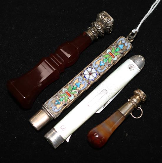 An early 20th century Russian silver and enamel cased pencil, a Georgian silver travelling fork and two seals.